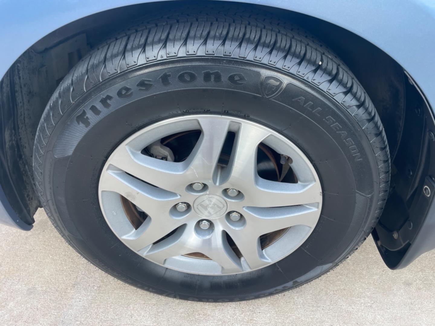 2007 Blue /Silver Honda Odyssey EX (5FNRL38457B) with an 3.5L V6 SOHC 24V engine, 5-Speed Automatic Overdrive transmission, located at 1501 West 15th St., Houston, 77008, (713) 869-2925, 29.797941, -95.411789 - Photo#15